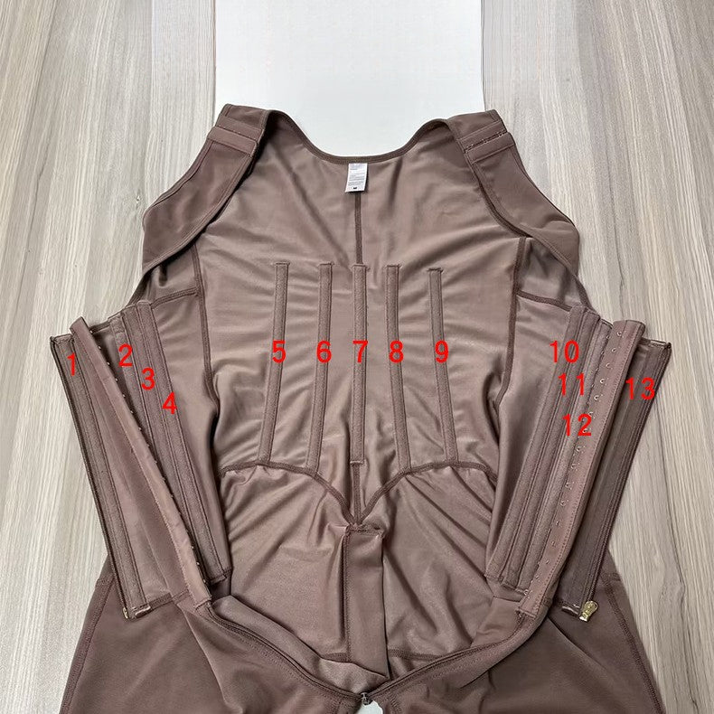 13 bone shaping jumpsuit with zipper button waist, raised hips, and chest